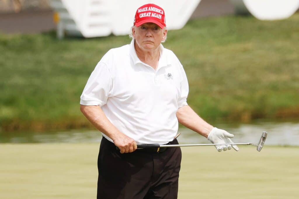 Biden's campaign hits Trump for golfing on his day off from court.